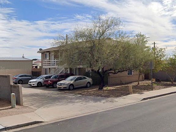 4 Plex - Unit 102(bottom left) & lit parking lot