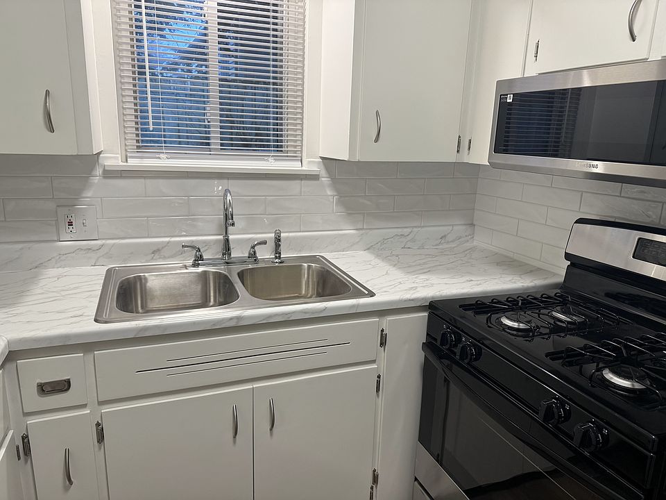 New sink, countertop, stove & micro.