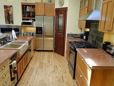 Custom Island & double sink with Sandstone Counter