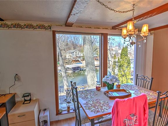 A large picture window overlooks the back yard from the dining area.
