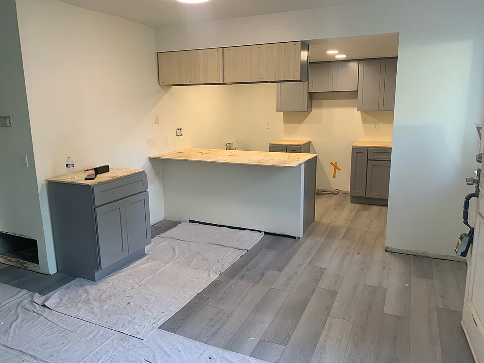 This is the kitchen still in process of being remodeled the cabinet to the left is actually the bathroom cabinet