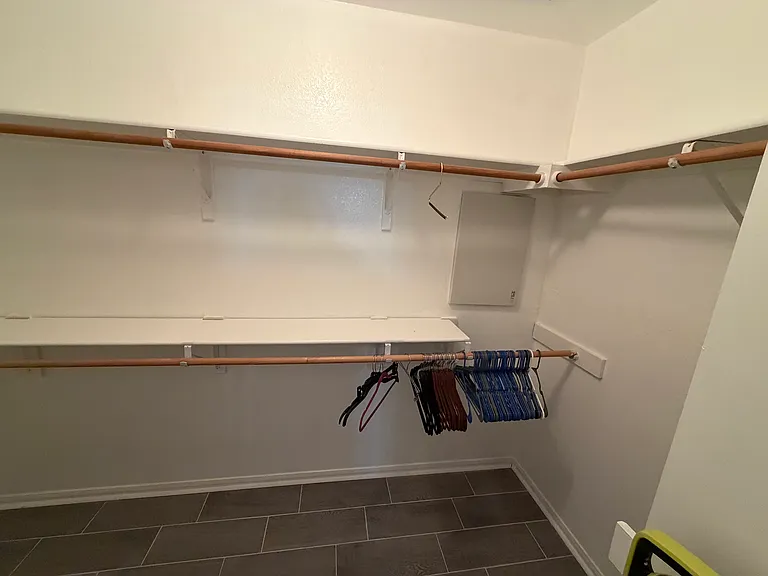 Alternate view of walk-in closet.