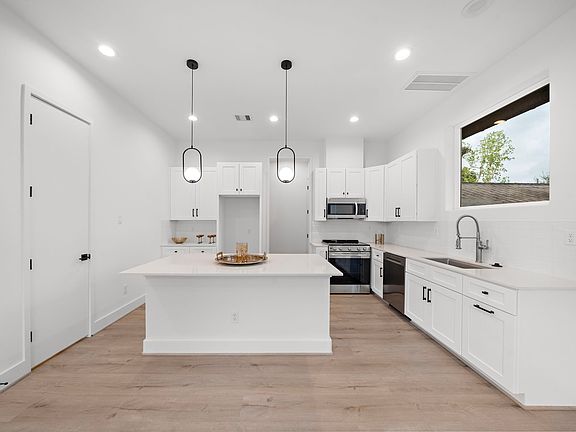 Kitchen view as you walk through the door