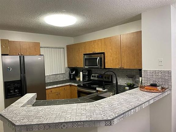 5th image of 8750 N Sherman Cir #20H