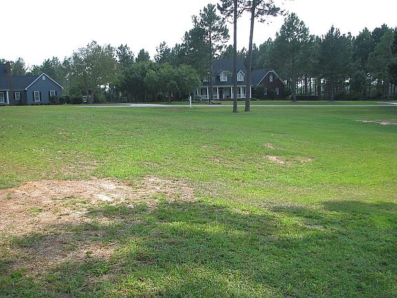 Facing SE across lot