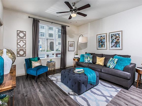 Select homes feature wood-look flooring in the living spaces