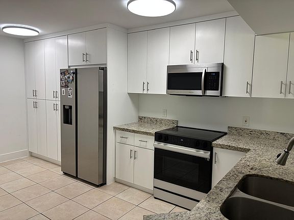 3rd image of 9033 Wiles Rd APT 101