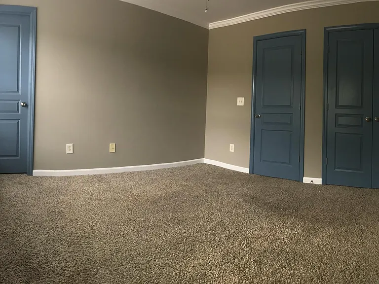 a secondary bedroom with two windows.

jack & jill bathroom (door on left) door to hallway (double doors) closet