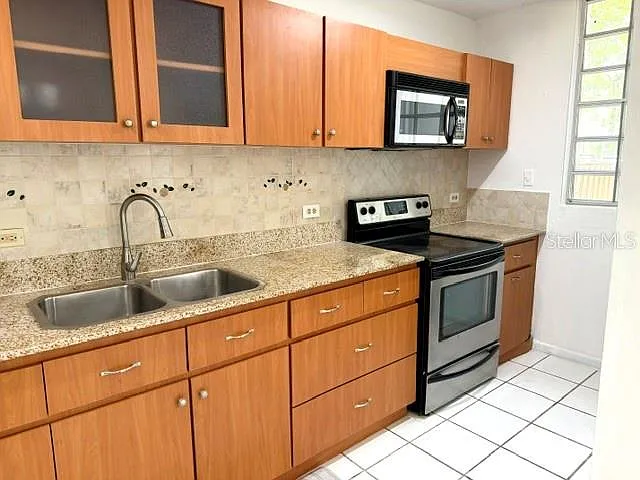 5870 Jose Tartak St #B1 — Photo 2