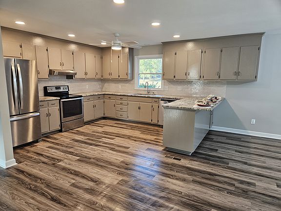 Recently remodeled kitchen with stainless steel appliances and granite counter tops.