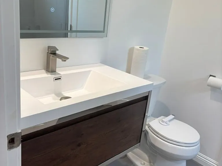 10610 Rhodesia Ave — Photo 24