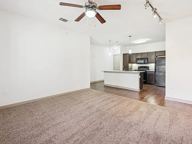 Spacious Living Room with Ceiling Fan