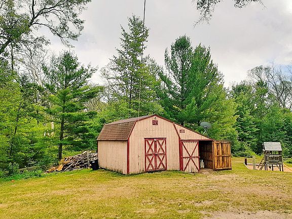 Shed and chicken coop.