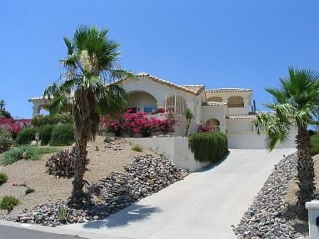 Great curb appeal with beautiful landscaping, high on a hill on a cul-de-sac
