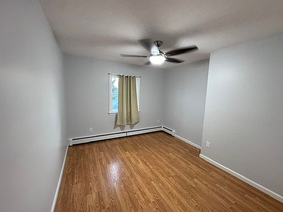 Bedroom comfortably fits queen size bed