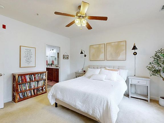 Master bedroom with door leading to master bath.