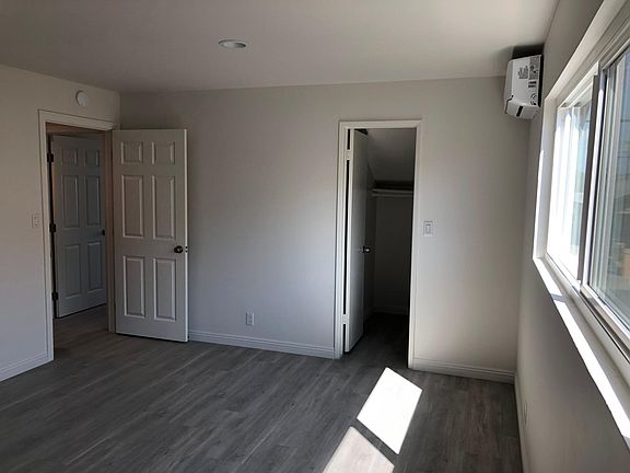 Master Bedroom With A Walk-In Closet & Bathroom.