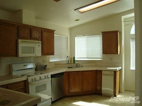 Huge, Well Lit Kitchen With Plenty of Storage Space!
