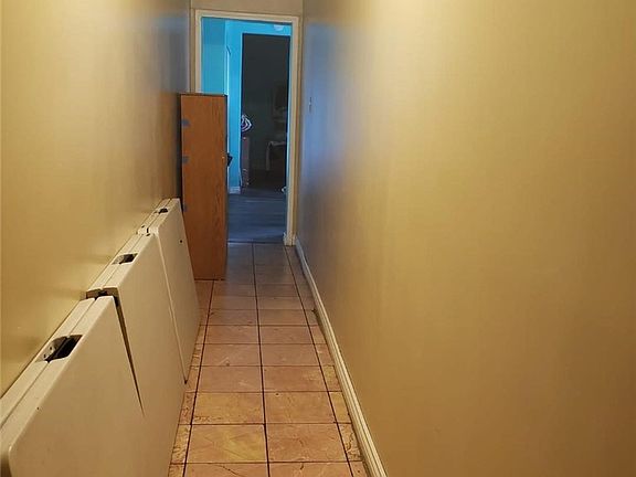 5th image of 7216 S Denker Ave