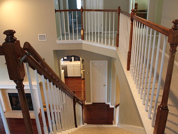 Stairway connecting first to second floor landing