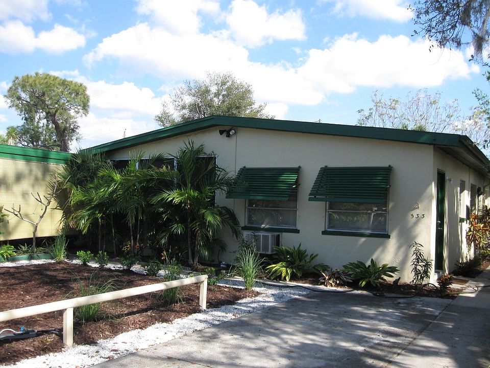 This is the front yard of the two duplex apartments. 531 apartment is on the left. New awnings are to be installed over the 533 den windows this November.