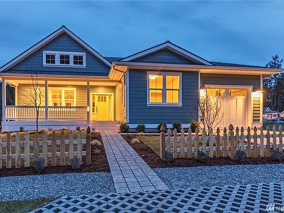 It's a beautiful glow in this great neighborhood!  PHOTO OF SIMILAR HOME ON NEARBY LOT