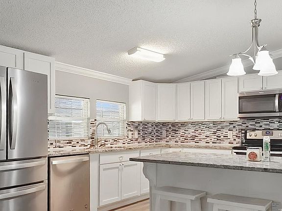 4th image of 16954 Florida Blvd