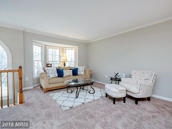 Open and airy Living room with bay windows.