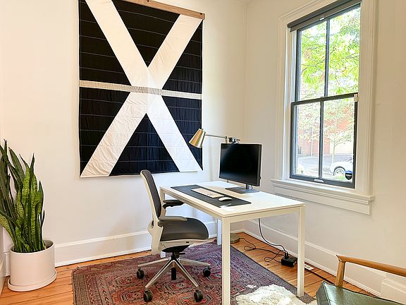 Second bedroom at front of the house, includes large step-in closet with Elka shelving