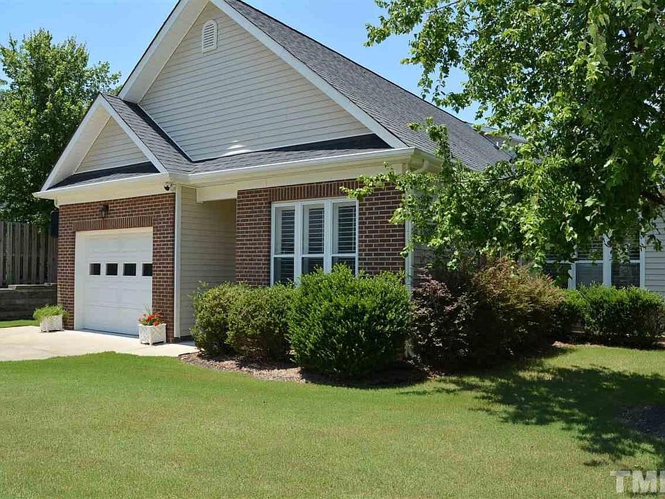 Nicely Landscaped Lot with Fenced Back Yard. Exterior of Home is Vinyl with Brick Front. HOA dues covers the exterior Maintenance.