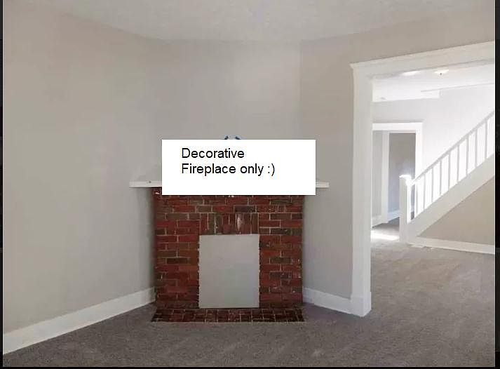 decorative fireplace in the newly remodeled living room