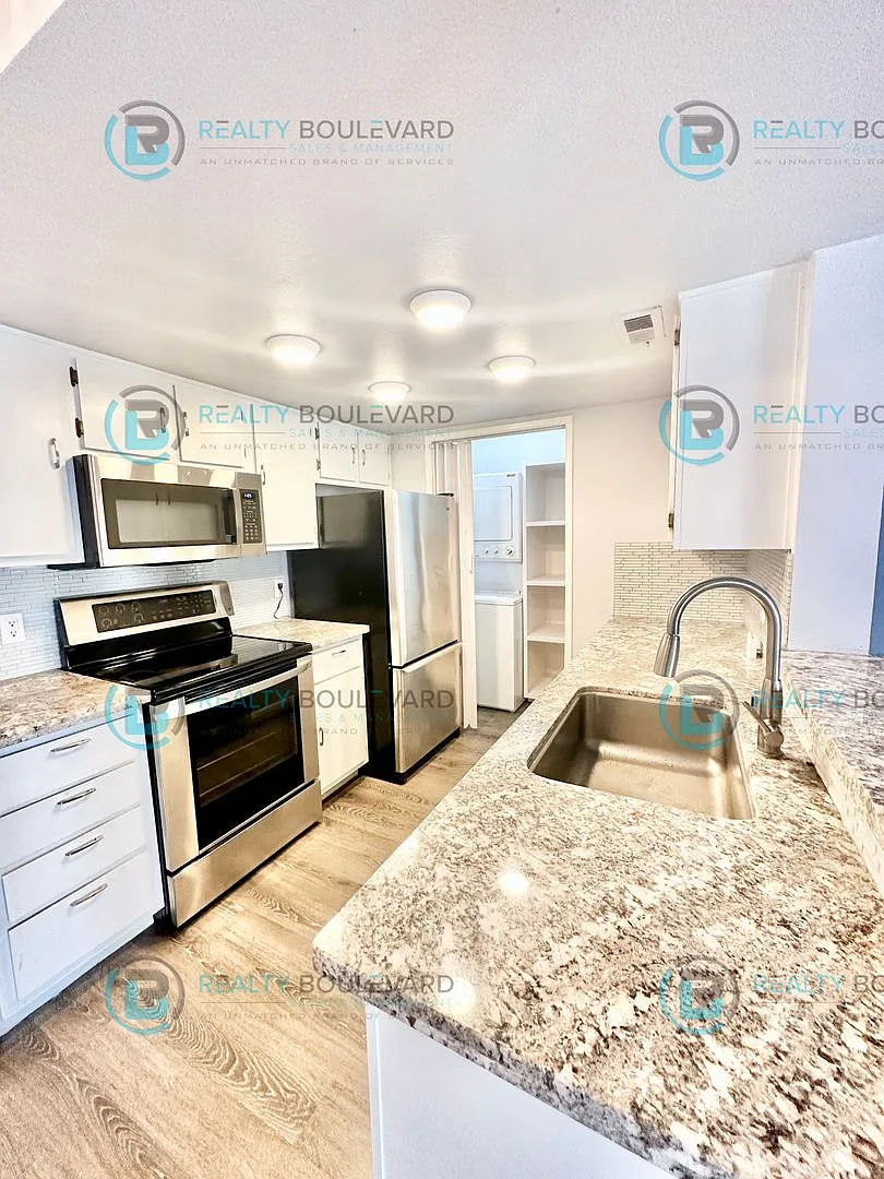 1/2 Month Free!! Indulge in comfortable living at Wood Chase Condos! — Photo 2