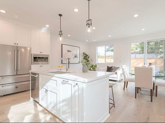 Living room/Kitchen opens to bright, spacious, colorful back garden