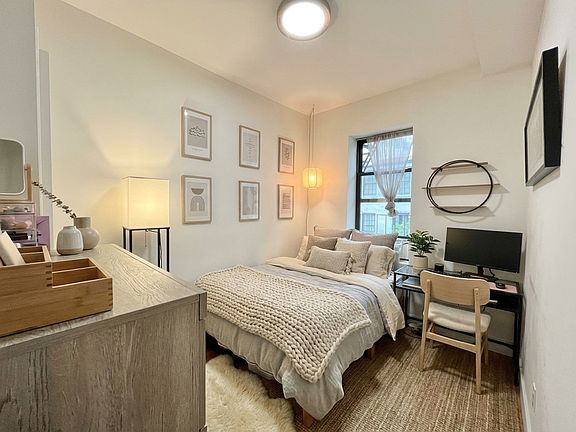 3rd image of 153 E 18th St APT 11