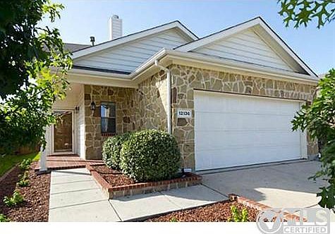 FANTASTIC interior lot with a covered porch and great curb appea