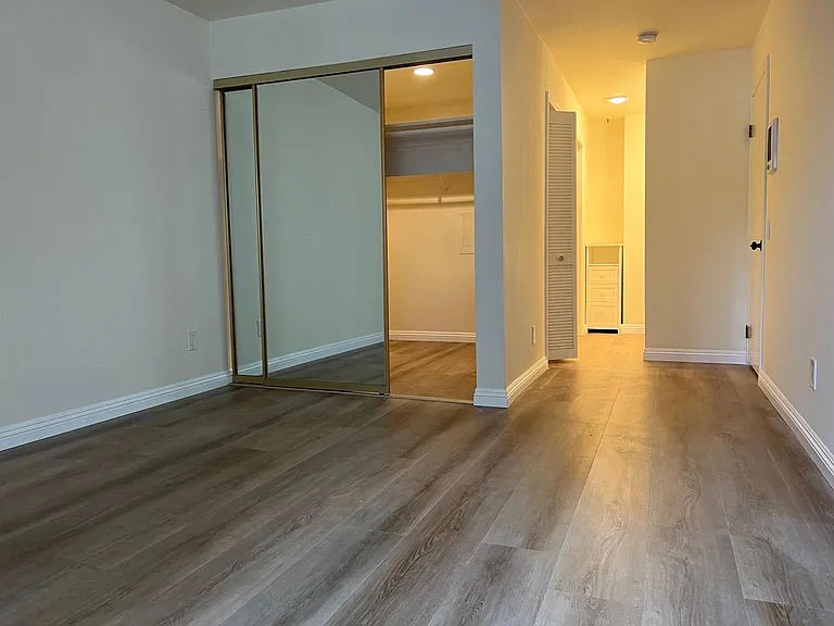 Master bedroom with large walk-in closet and attached master bath