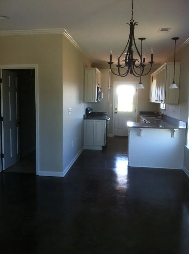 Roll Tide Condos — Photo 4