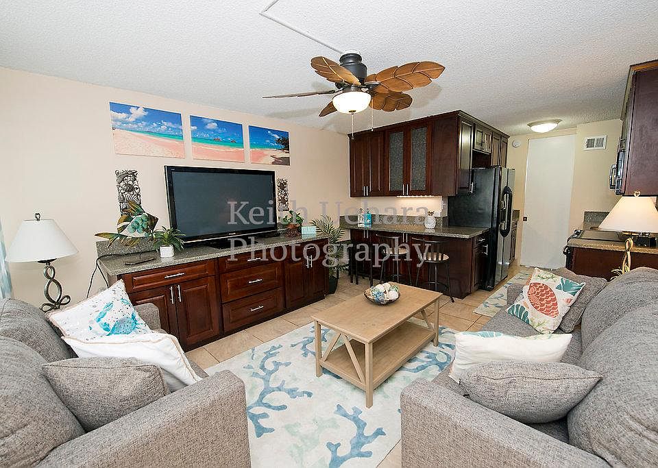 Living Room with new furnishings, plasma television and pull