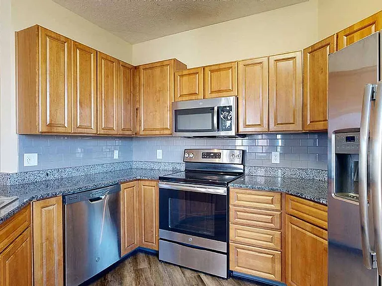 Entertain guests or cook your favorite dishes in this renovated kitchen in the 3-bed Milan.