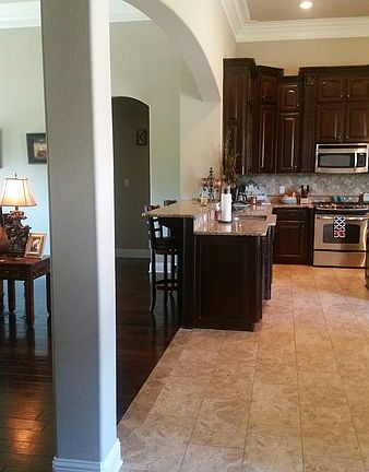 View of kitchen from the front foyer.