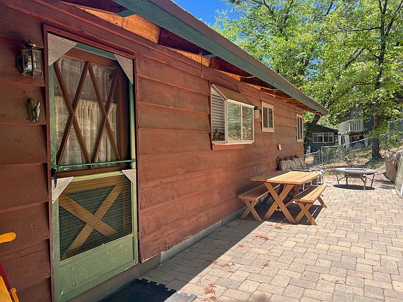 Back door and patio off the kitchen.