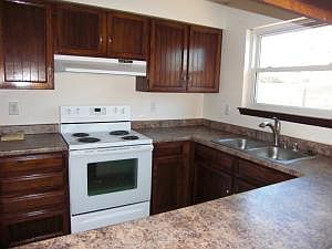 5th image of 7707 Buckboard Ave NE