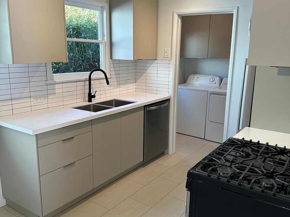 All new Kitchen... Including New kitchen cabinets, quartz countertops, Stainless gas stove and oven, microwave, dishwasher, sink and refrigerator.