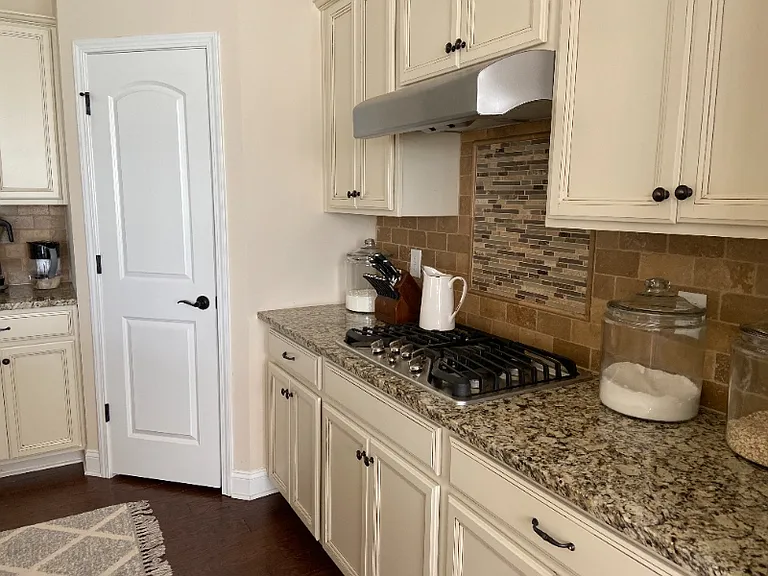 9610 Camberley Ave NW — Photo 3