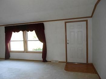 Front door view.  Large front window lets in lots of light.