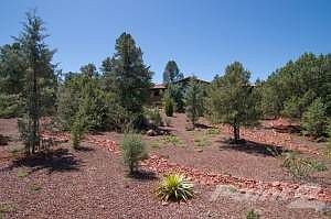 Private garden sanctuary on .94 acre