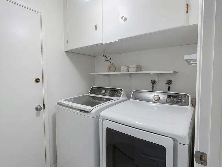 Laundry room with washer and dryer.