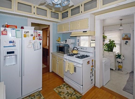 KITCHED WAS REMODELED TO MOVE THE REFRIGERATOR AND TOO ADD A DISHWASHER!