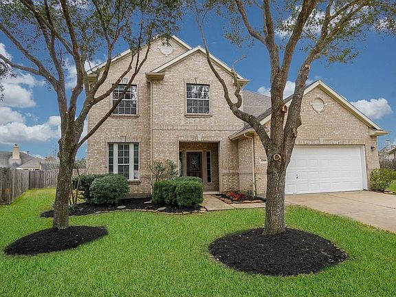 Lush landscaping and lovely curb appeal