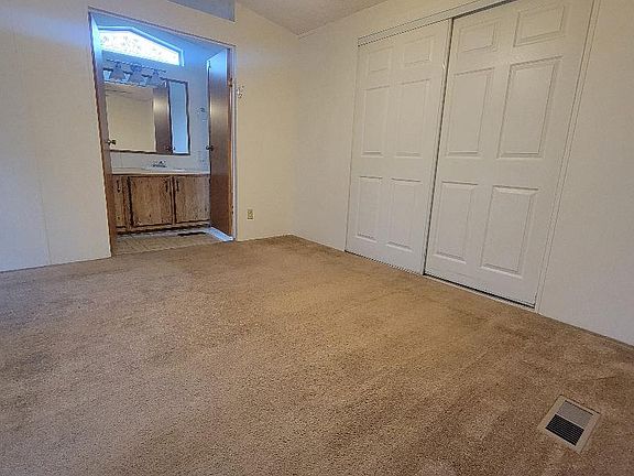 Master bedroom with double closet.
